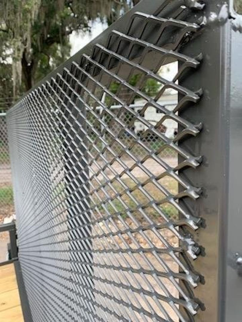 Steel lattice fence in a garden setting
