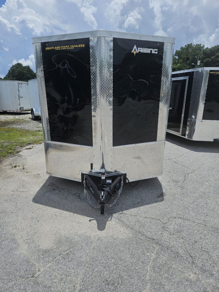 Shiny black and silver cargo trailer.