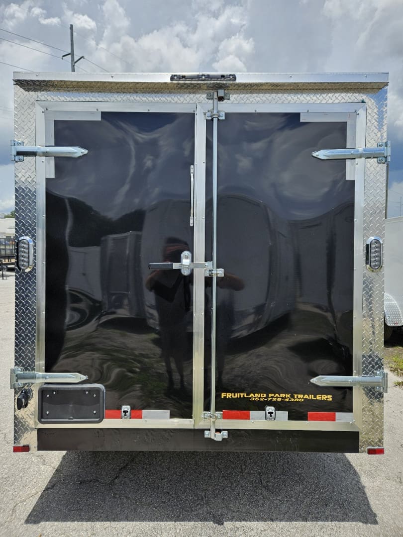 Black trailer with metal trim