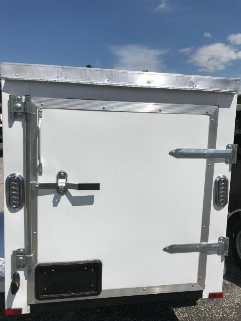 Secured trailer door on sunny day