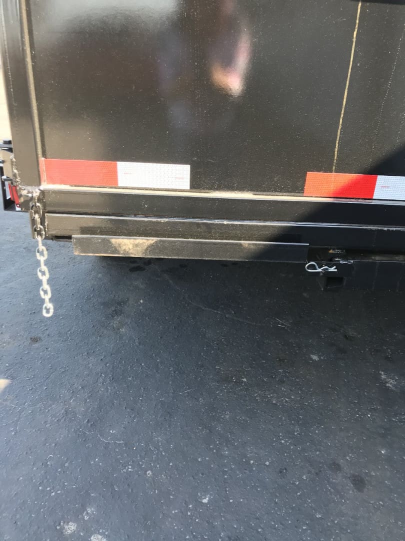 Black trailer with safety chain