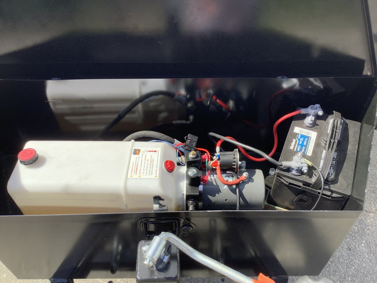 Battery and wiring inside machinery compartment