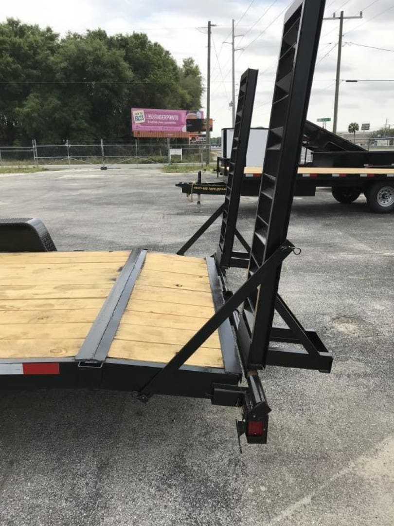 Utility trailer with loading ramps