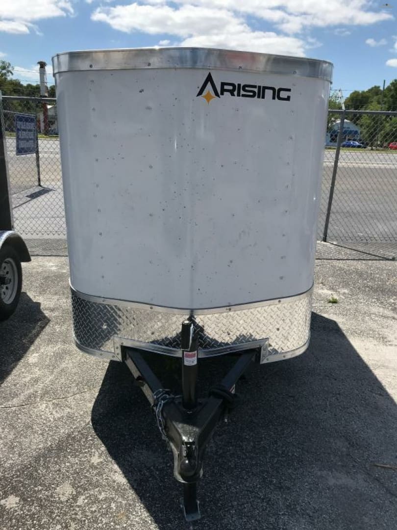 Enclosed trailer with metal trim