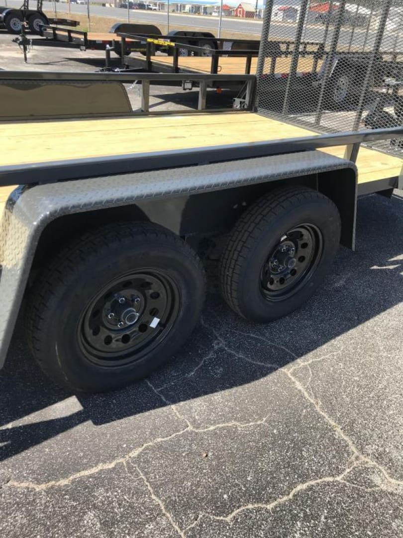 Trailer wheels on asphalt parking lot