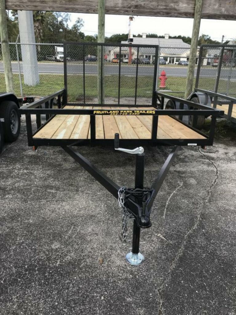 Open utility trailer with wooden deck