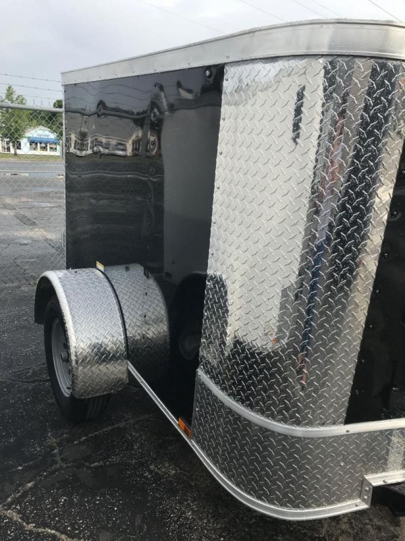 Shiny trailer with diamond plate design