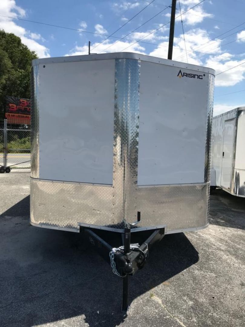 Enclosed cargo trailer under a blue sky