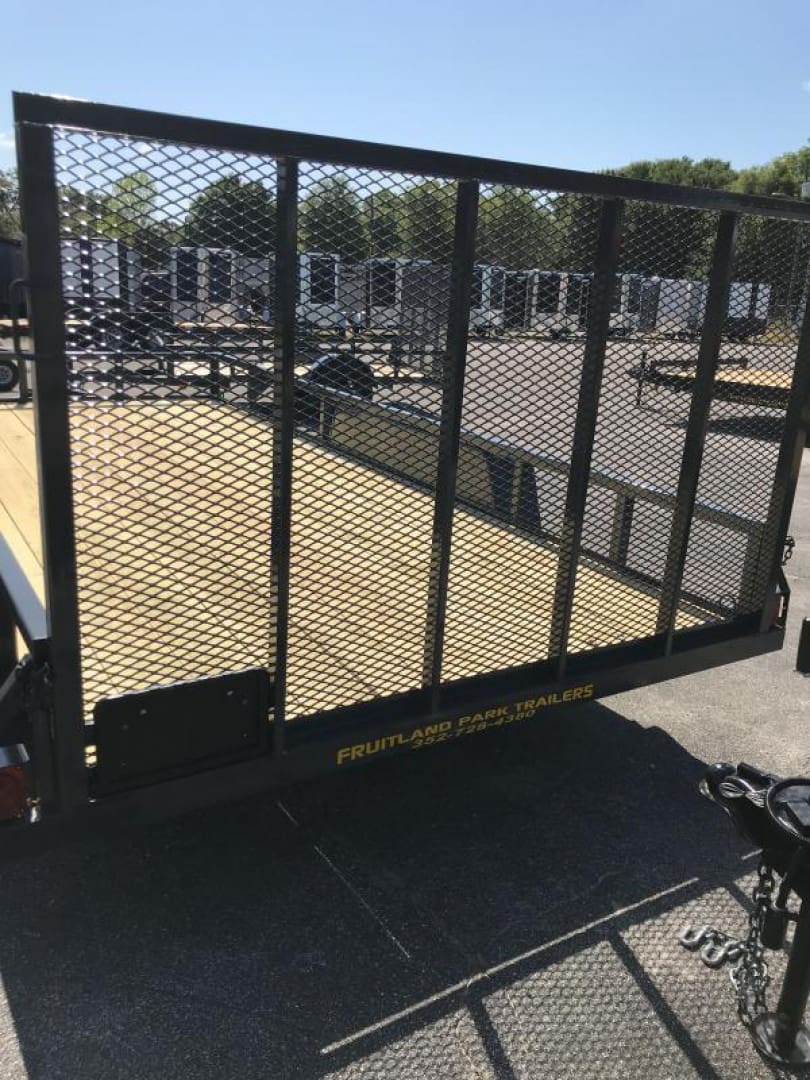 Flatbed trailer in sunny lot