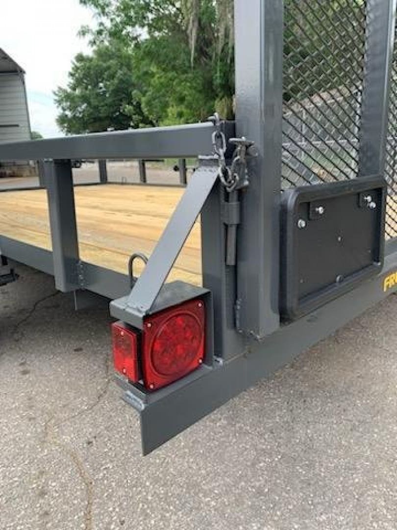 Metal trailer parked on asphalt surface
