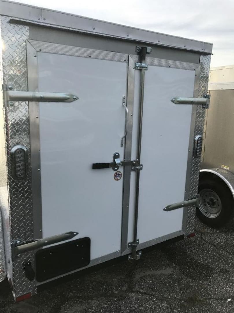 White cargo trailer with metal trim