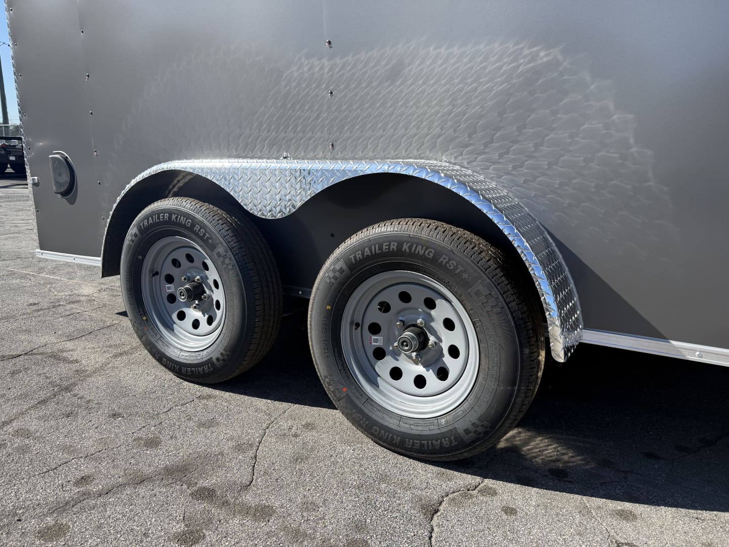 Dual axle trailer on sunny day