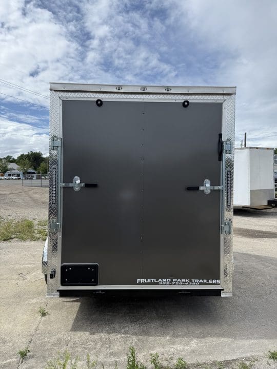 Utility trailer in parking lot
