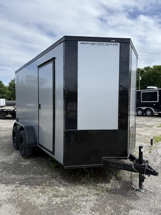 Enclosed utility trailer in parking lot