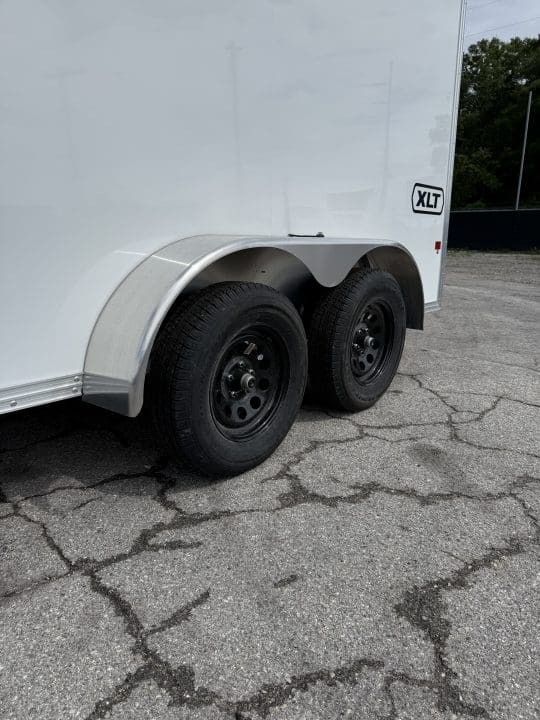 Trailer with dual black wheels