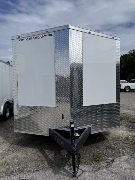 Enclosed trailer with white panels