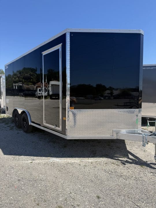 Shiny black trailer with dual axles