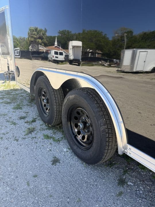Shiny black trailer with two wheels