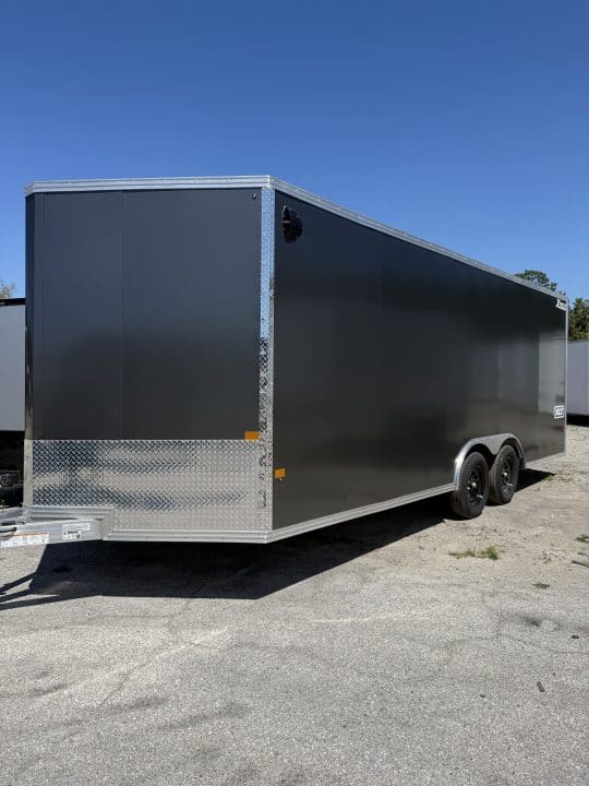 Enclosed trailer with dual axles parked